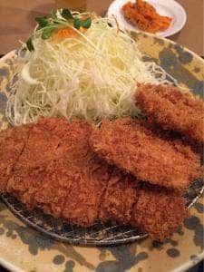かつ哲中居店