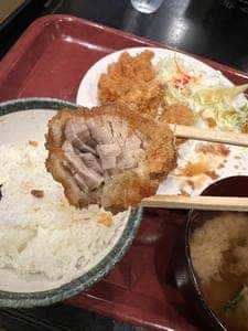もつ九