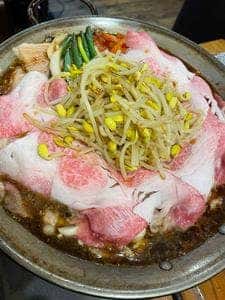 よし治