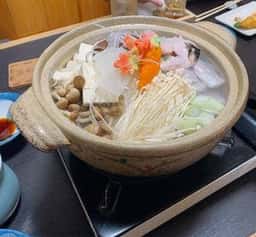 奈る実