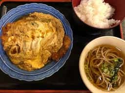 丸万