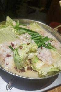 炭火野菜巻き串と餃子 博多うずまき 札幌大通店
