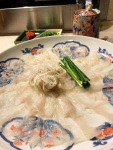奈る実