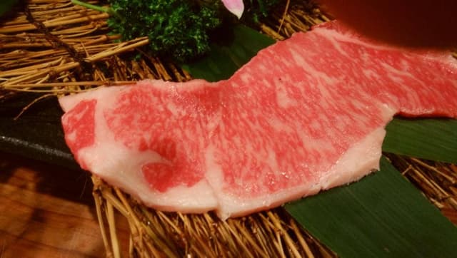 炭火焼 牛心 堤店 - サブ画像1