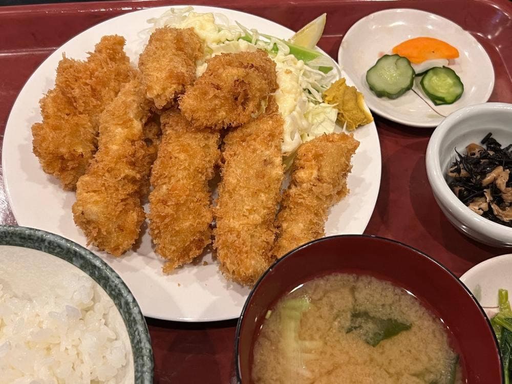 もつ九