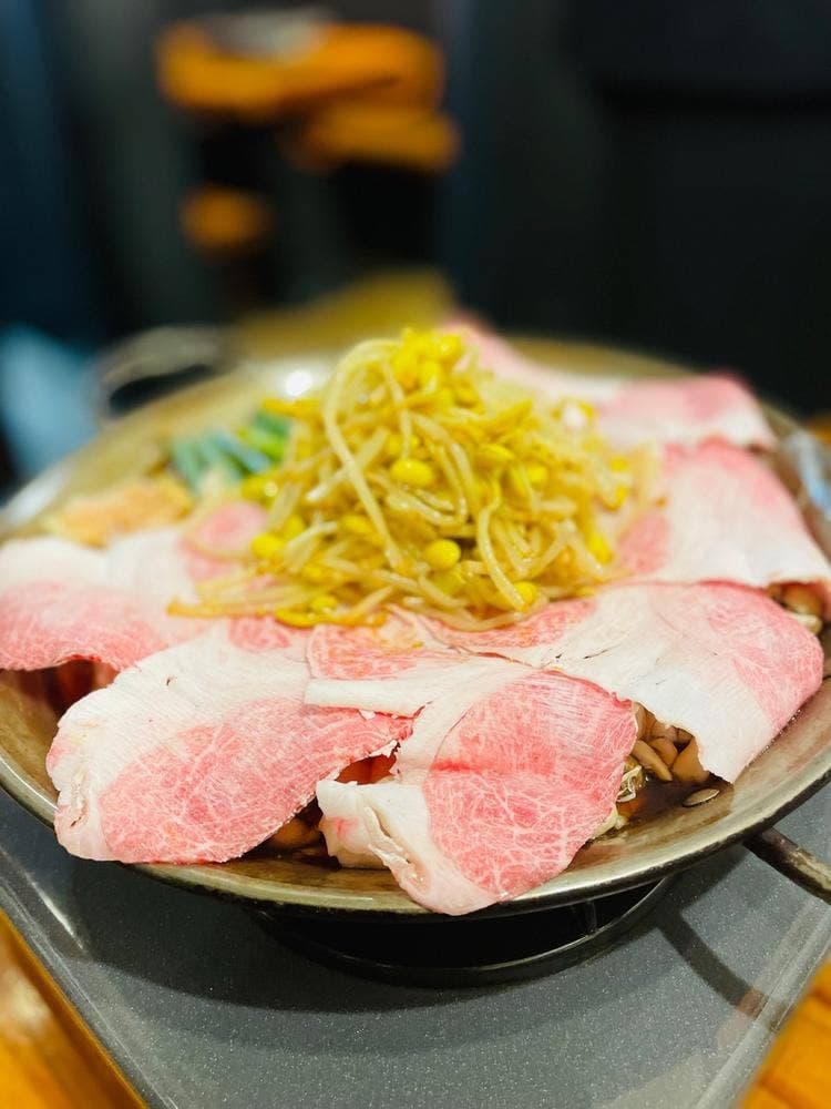 よし治