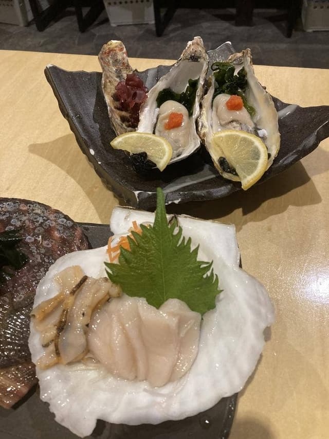 マルカン漁業部 海がき 本店 - サブ画像1
