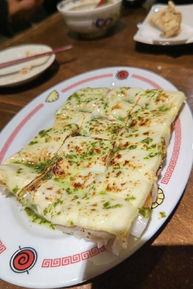 炭火野菜巻き串と餃子 博多うずまき 札幌大通店
