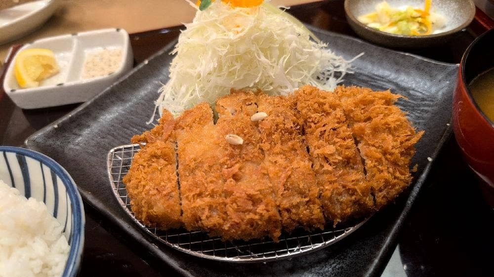 かつ哲中居店