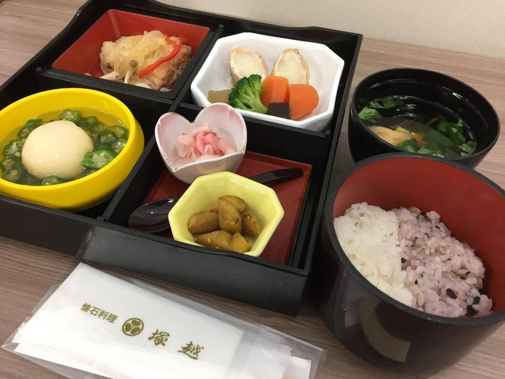 塚越