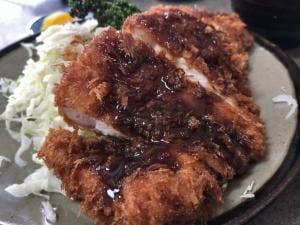 かつ善