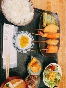串紀代