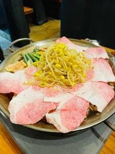 よし治