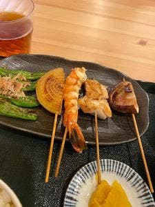 串紀代