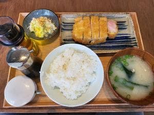 つかんと