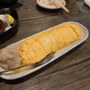 〇川商店