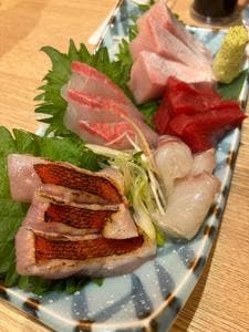 藁焼き小屋またふく 九条店