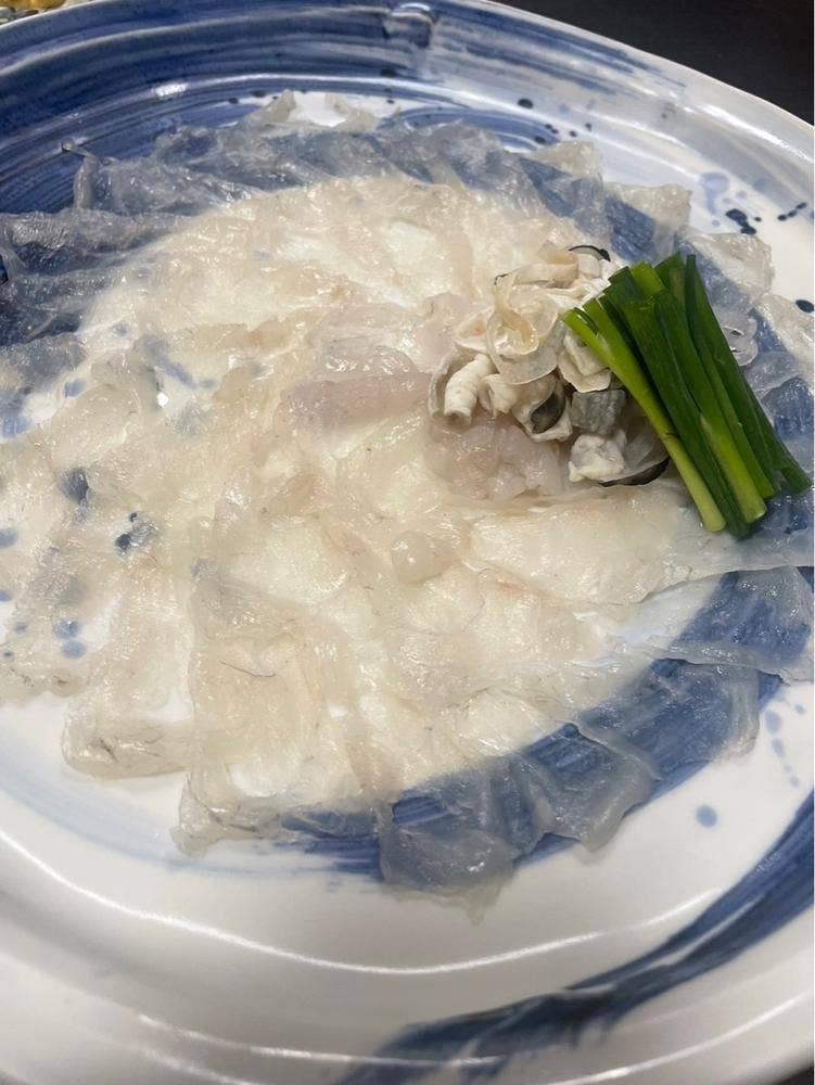 奈る実